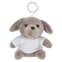 A grey plush dog keyring with a white shirt and a metal keyring attachment.