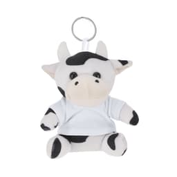 A plush keyring of a cow with black and white spots, wearing a simple white shirt. It has a metal keyring attached.