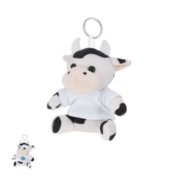 A plush keyring featuring a cow design in black and white, wearing a white shirt, with a silver keyring attachment.