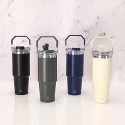 A drink bottle set featuring four insulated cups in black, grey, navy, and cream, each with a handle and lid.