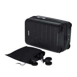 A black wheeled bag with a textured surface and a drawstring pouch containing weights. It includes a logo.