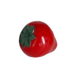 A red strawberry-shaped lip balm with a green leaf topping, featuring a glossy finish.