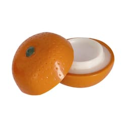 An orange-shaped lip balm container with a smooth, cream-coloured interior and a textured, vibrant orange exterior.