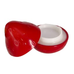 A red, strawberry-shaped lip balm container with a white inner cap. The container has a shiny finish and rounded design.