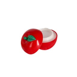 A red apple-shaped container with a green leaf, featuring a white lip balm inside. It has a smooth, glossy finish.