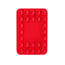 A red silicone tray featuring multiple round cavities, designed for creating ice or baking.