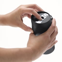 A drink bottle in matte black, featuring a finger pressing a button on the lid, with a logo visible.