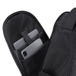 A black backpack interior with two pockets holding electronic devices. The backpack has a logo on the exterior.