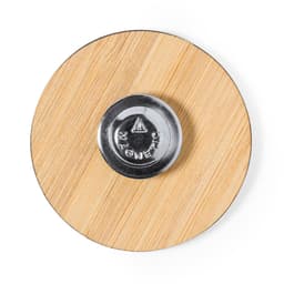 A wooden lapel pin featuring a round metallic magnet on the back. The surface has a natural finish.