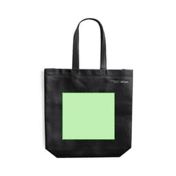 A black tote bag with two handles and a green rectangular design in the centre. Features a logo.