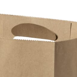 A brown kraft paper bag with a scalloped top and a circular handle cutout. It features a plain design and a logo.