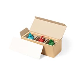 A gift set box in brown, featuring three small pouches in red, blue, and green, arranged in a natural fibre interior.