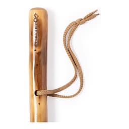 A bamboo walking stick with a braided cord attached for grip, featuring a logo on the top.