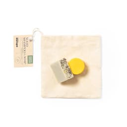 A solid shampoo bar and soap in yellow and cream, packaged in a natural canvas bag with a logo.