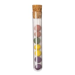 A clear test tube with a cork stopper containing colourful round chocolates in shades of pink, yellow, green, and purple.