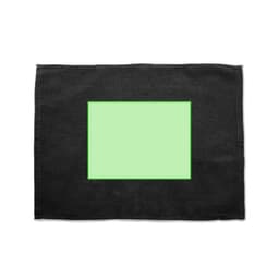 A black placemat with a green rectangular centre and a subtle texture. It has a branding logo in the corner.