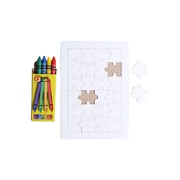 A white puzzle board with various shaped pieces and a box of crayons in red, yellow, green, blue, and purple.