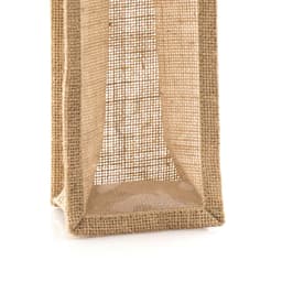 A natural jute bag with a textured mesh design, featuring an open top and a square base. It has a simple branding logo.