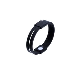 A black silicone wristband with a small white detail, featuring a logo on the interior.