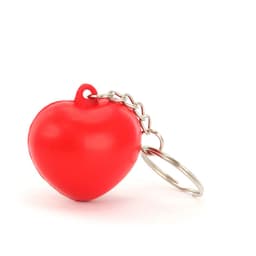 A red heart-shaped stress keyring attached to a metal chain and keyring. It has a smooth, glossy finish.