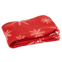 A red blanket featuring white snowflake patterns, neatly folded. The blanket has a soft, plush texture.