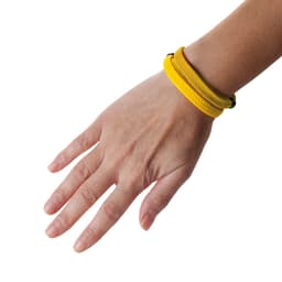 A yellow braided wrist bracelet with a black clasp, displayed on a hand.