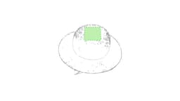 A round hat with a green square patch on the top, featuring a soft texture and a wide brim.