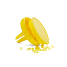 A yellow Scrib Air Freshener with a decorative lid and scattered fragrance beads around it. It has a logo on the lid.