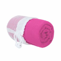 A rolled pink gym towel stored in a white mesh bag with a drawstring closure. The product has branding.