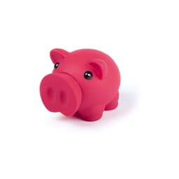 A pink pig-shaped money box with shiny black eyes and a smooth finish, featuring a small slot on top for coins.