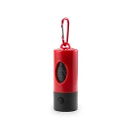 A red and black waste bag dispenser featuring a carabiner clip for attachment. It has an oval opening for easy access.