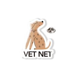 A lapel pin featuring a cartoon dog with spots and a heart tag, alongside a metal backing.