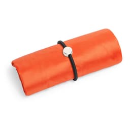 An orange foldable bag wrapped with a black band, featuring a silver button.