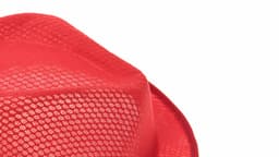A red kids' hat featuring a textured mesh design and a branded logo.