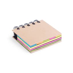 A spiral-bound notebook with a kraft cover and colourful pages in blue, green, yellow, pink, and black.