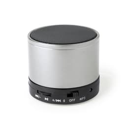 A compact silver Bluetooth speaker with a black base featuring control buttons and a mesh grille on top.