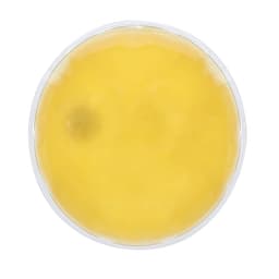 A round container filled with a yellow liquid, featuring a smooth surface and clear edges.