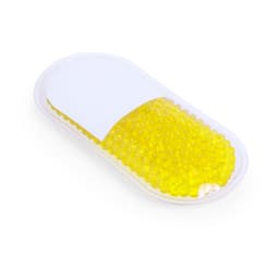 A yellow gel pack with a smooth surface, enclosed in a white plastic casing, designed for health and personal care.