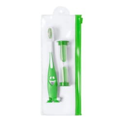 A green toothbrush with a smiley face, an hourglass timer, and a clear zippered pouch.
