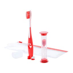 A red toothbrush with a smiling design, an hourglass timer, a travel pouch, and two dental tablets.