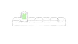 A green pillbox with compartments for medication, featuring a holder section at one end.