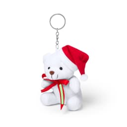 A white teddy bear keyring wearing a red Santa hat and green ribbon, attached to a metal keychain.