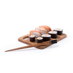 A wooden chopping board featuring sushi, alongside a pair of chopsticks. The board has a circular cut-out.