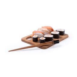 A wooden cutting board with assorted sushi and a pair of chopsticks. The sushi features various ingredients and colours.