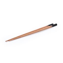 A pair of bamboo chopsticks with black tips and decorative bands, designed for dining.