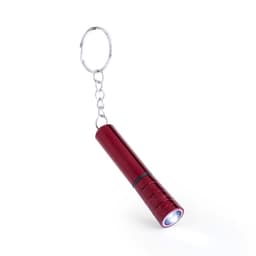 A red keyring torch with a metal chain, featuring a small flashlight at the end. It has a shiny finish and a compact design.