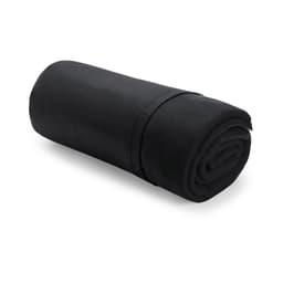 A rolled black blanket featuring a soft texture, suitable for home use. It has a simple design and includes branding.
