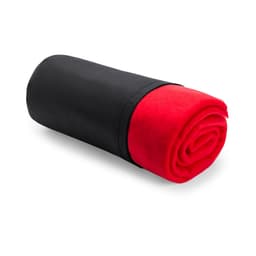 A rolled blanket featuring a black exterior and a vibrant red interior, also displaying a logo on the fabric.