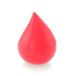 A red stress ball shaped like a droplet, featuring a smooth surface and rounded tip. Includes a brand logo.