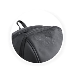 A close-up of a black backpack with a slightly damp surface, featuring zippers and a logo.